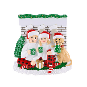 Sitting in Front of Fireplace with Dog Ornament